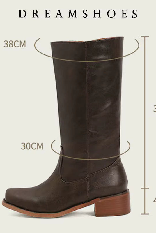 Close-up of the toe area of the brown Anya classic western boots, featuring the subtly pointed shape and smooth finish.