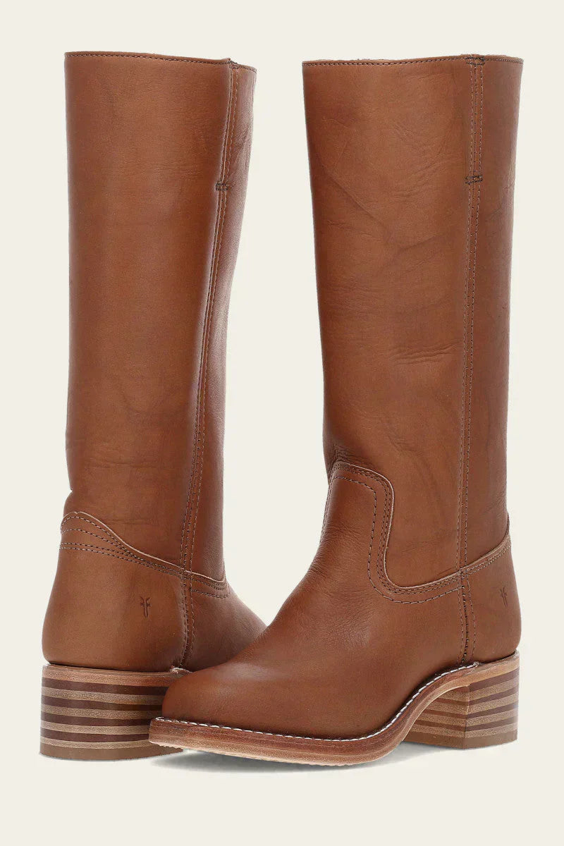 Side profile of the Anya classic western boots in yellow, highlighting the elegant curve and sturdy block heel.