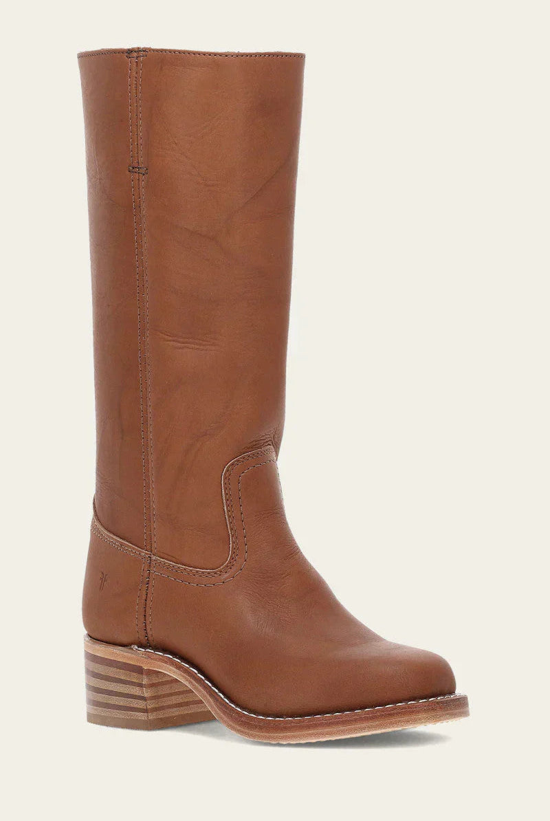 Anya classic western boots in brown, worn by a model in a casual outdoor setting, showcasing their comfortable fit.