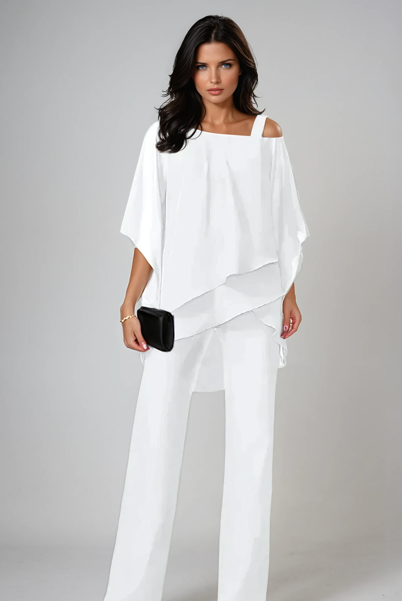 Front view of the Aviana two-piece layered set in black, showcasing its flowing top and wide-leg trousers on a model.
