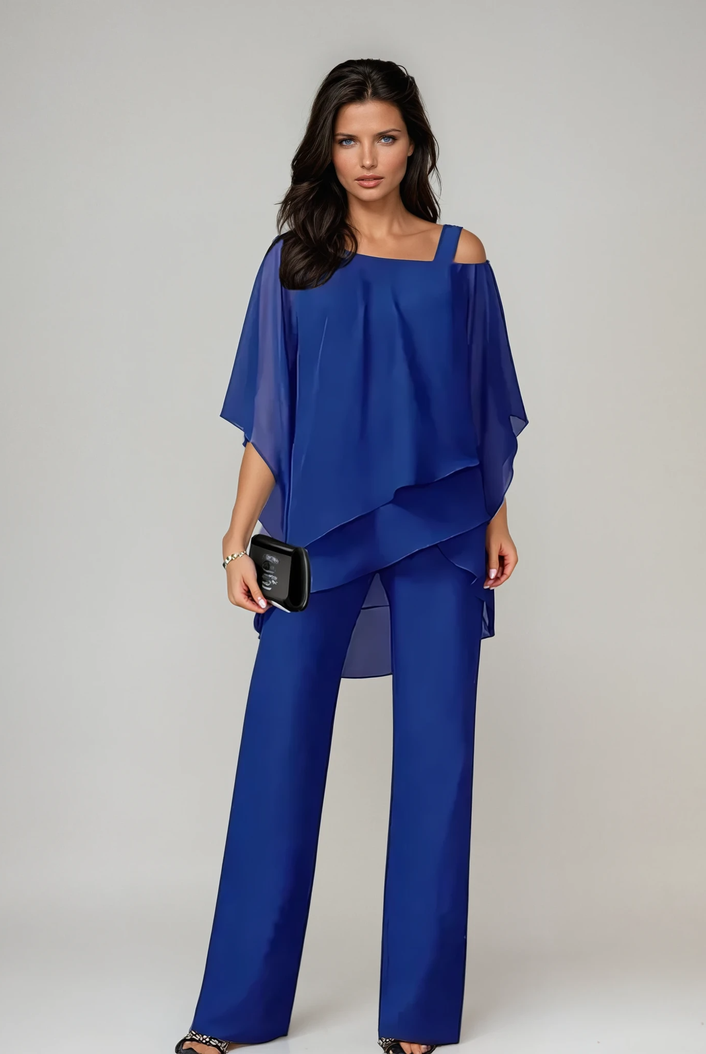 Side profile of a woman wearing the Aviana two-piece layered set in white, highlighting the graceful drape and relaxed fit.