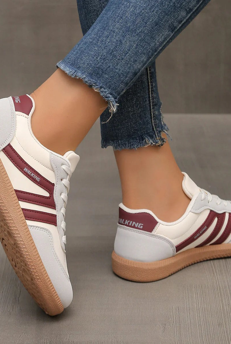 Brown Briony orthopaedic trainers, positioned to highlight the material texture and robust construction.