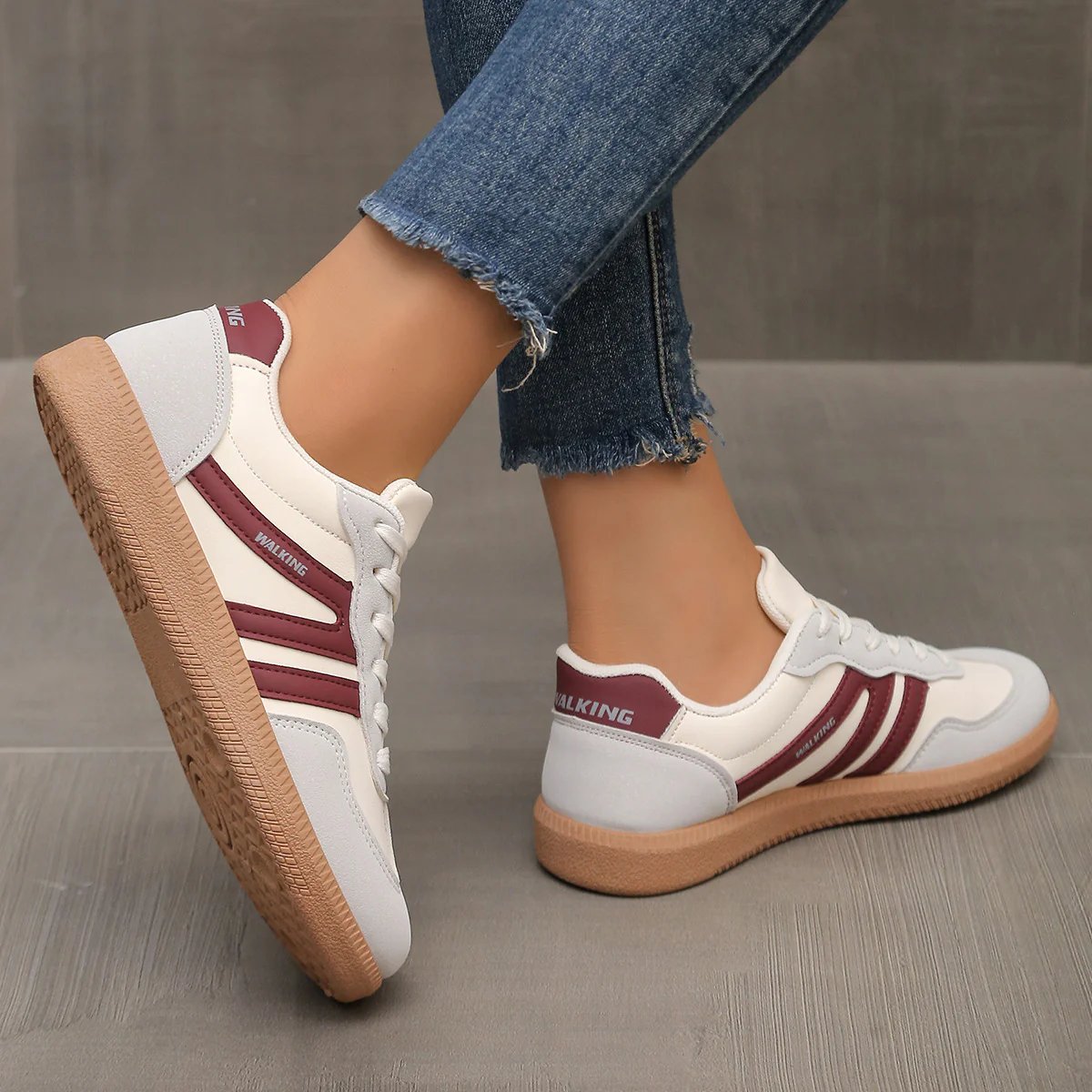 Brown Briony orthopaedic trainers, positioned to highlight the material texture and robust construction.