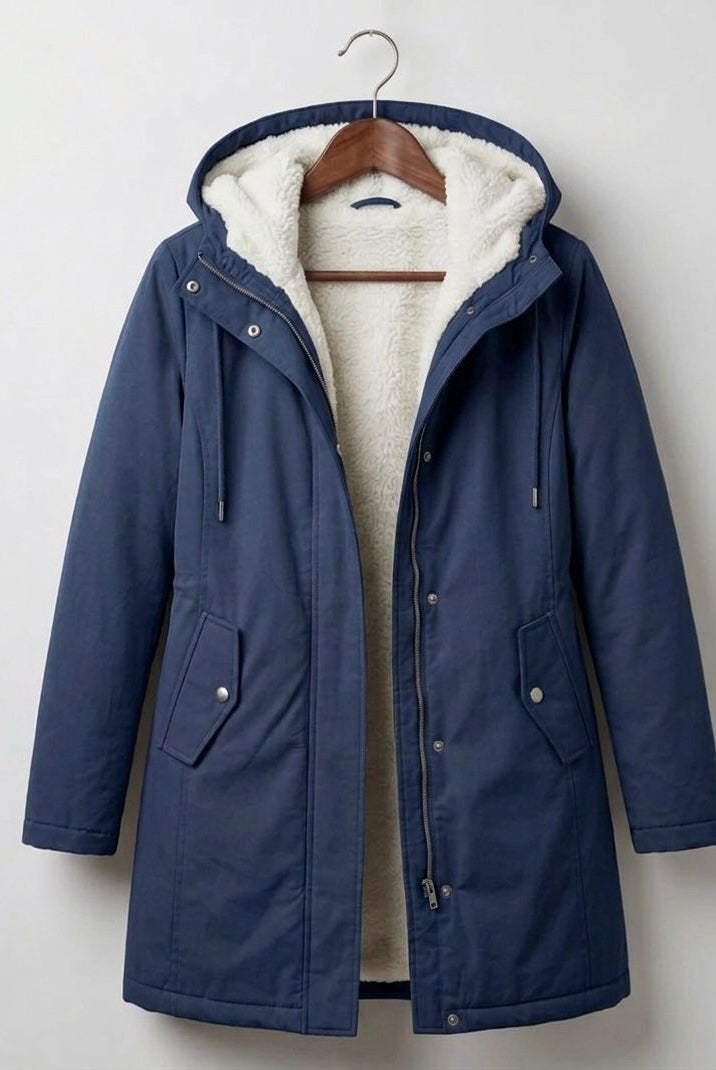Front view of the grey Elara waterproof fleece-lined parka, showcasing its tailored fit and storm hood.