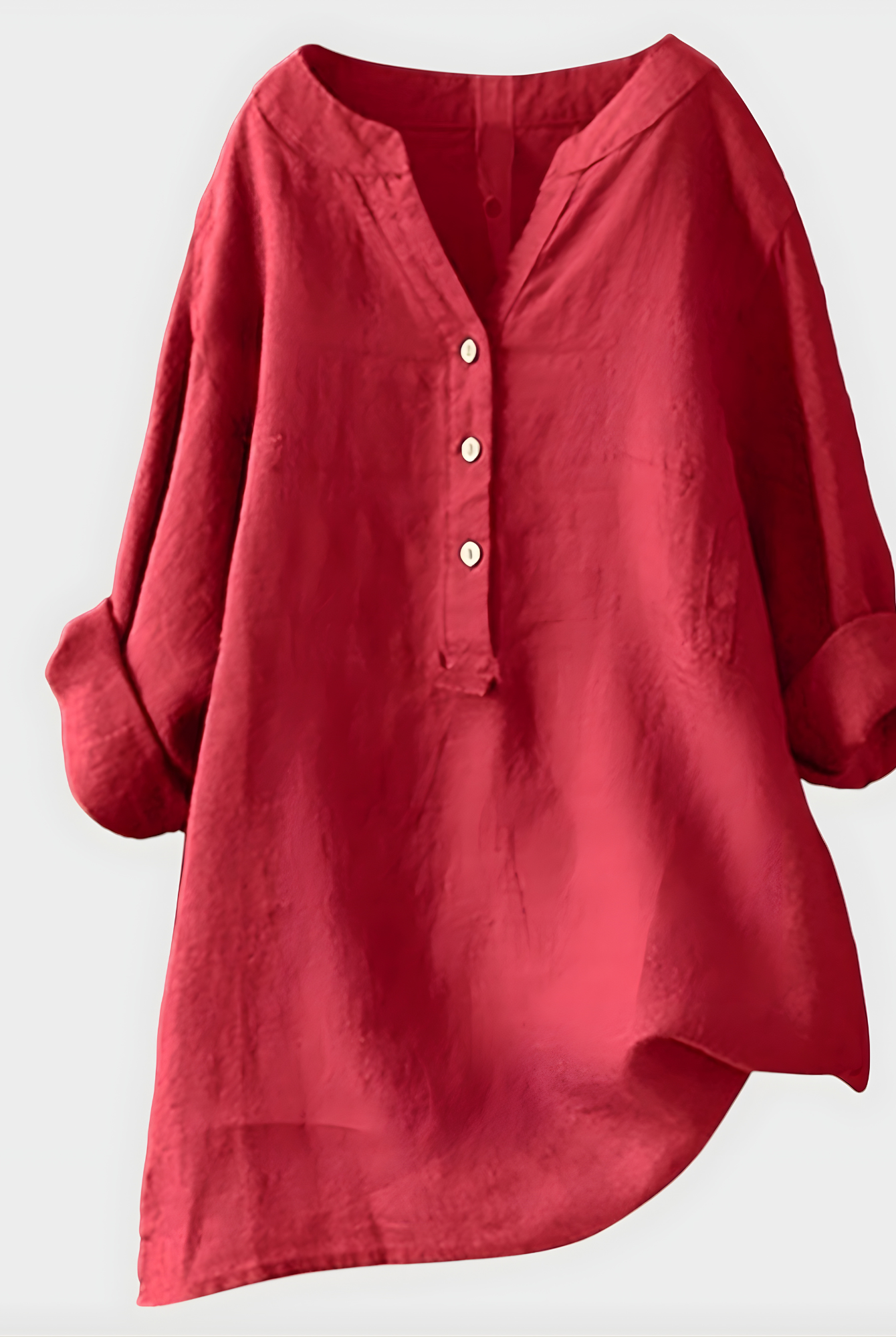 Front view of a woman wearing the Elara elegant cotton-linen blouse in watermelon pink, casually styled.