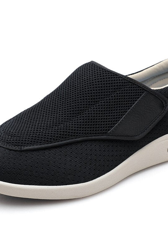A close-up of the sole of an Elara comfort shoe, detailing the non-slip tread pattern for enhanced stability.