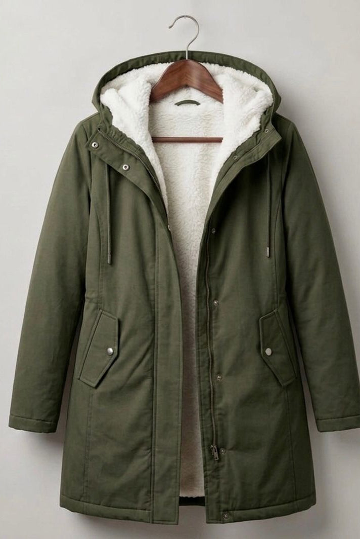 Detail of the wrist cuff and sleeve design on the khaki Elara parka, indicating a secure fit.