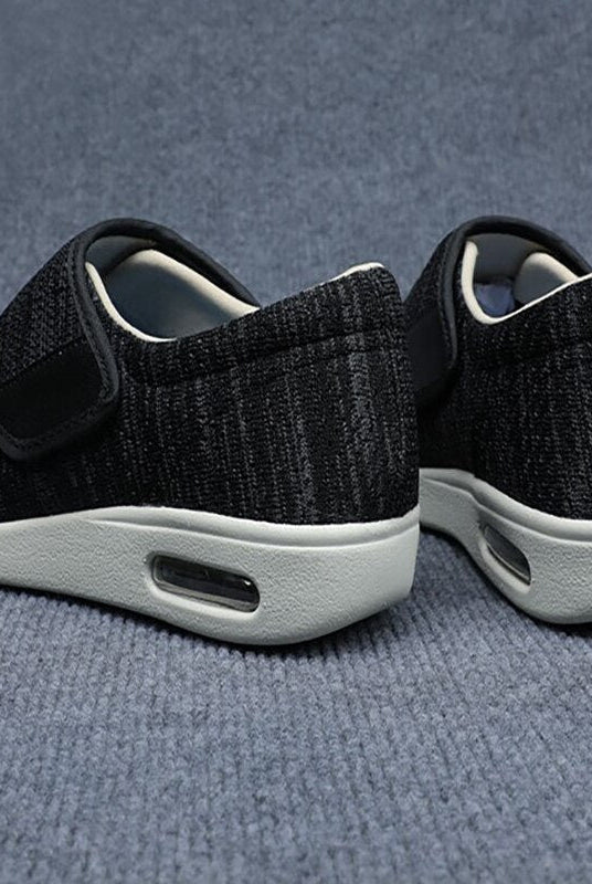 A woman's foot gently sliding into an Elara diabetic comfort shoe, illustrating the easy on-and-off feature.