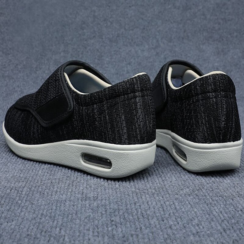 A woman's foot gently sliding into an Elara diabetic comfort shoe, illustrating the easy on-and-off feature.