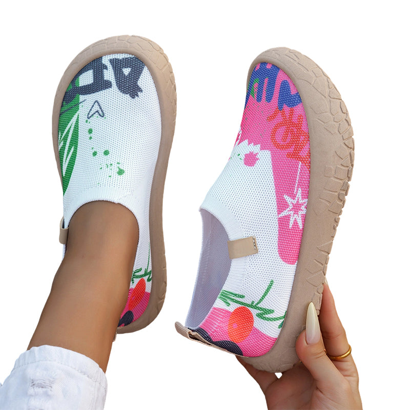 The Ella artistic slip-on shoes displayed on a clean surface, emphasizing their cheerful and colorful aesthetic.