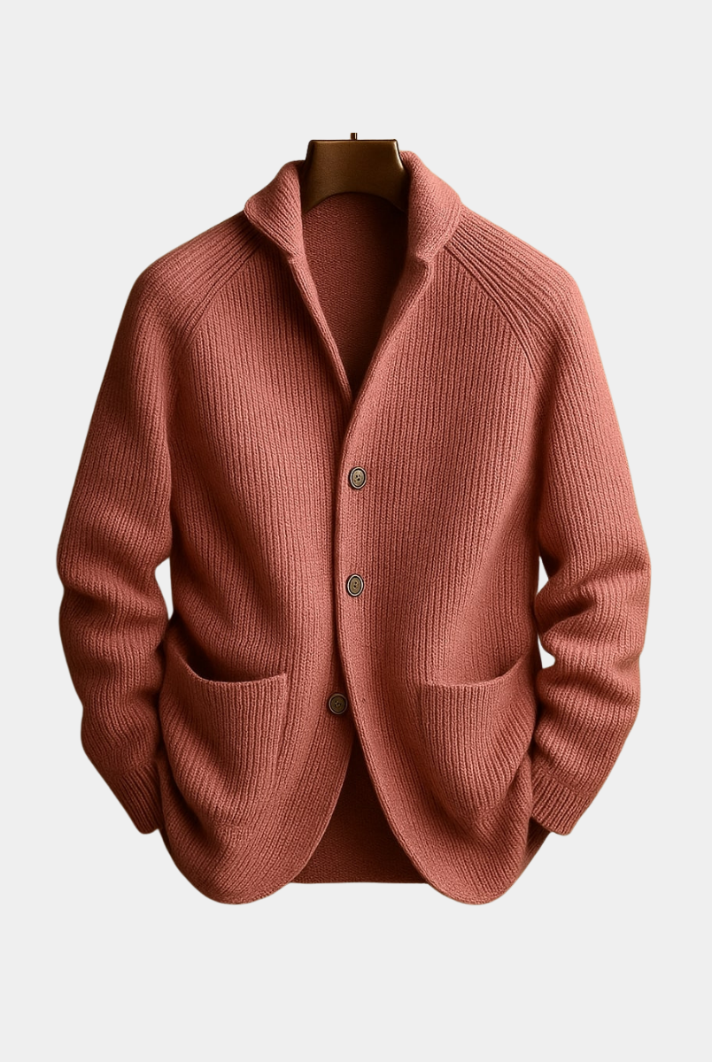 Front view of a man wearing the dark blue Florian wool cardigan over a light shirt, showcasing the ribbed texture.