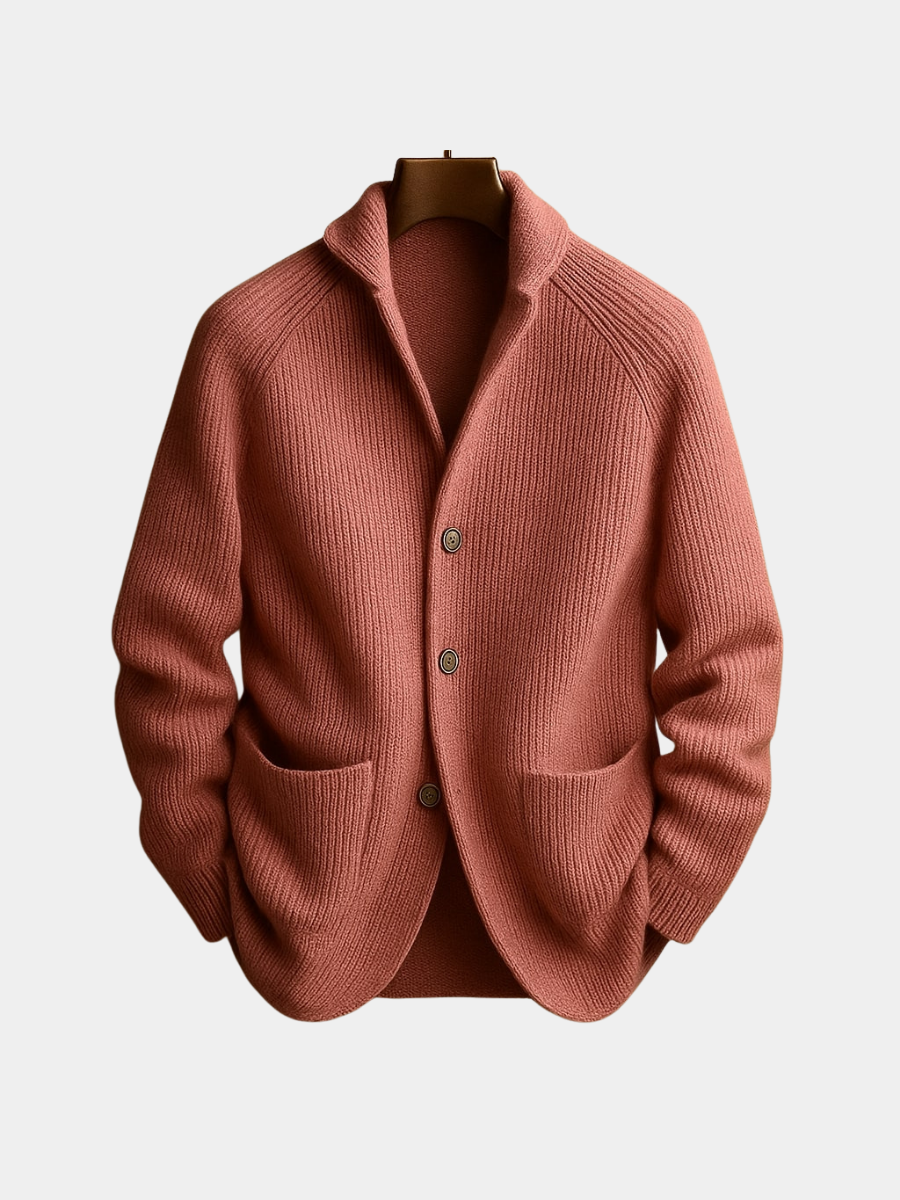 Front view of a man wearing the dark blue Florian wool cardigan over a light shirt, showcasing the ribbed texture.
