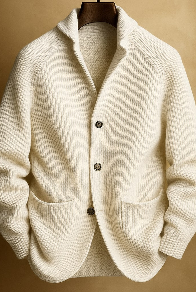Close-up detail of the three-button closure on the classic men's wool cardigan.