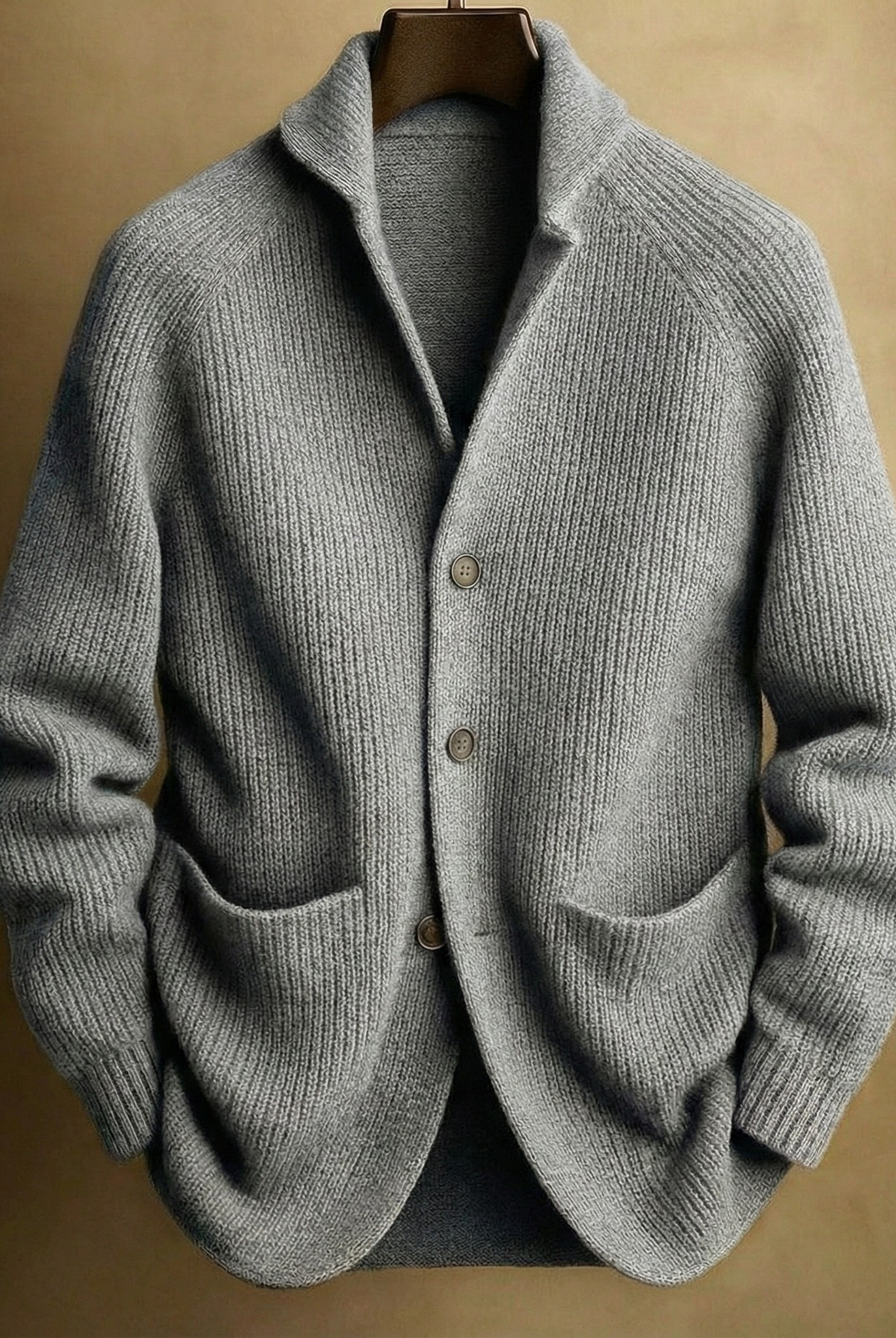 Texture shot of the ribbed knit fabric on the Florian wool cardigan, showing material quality.