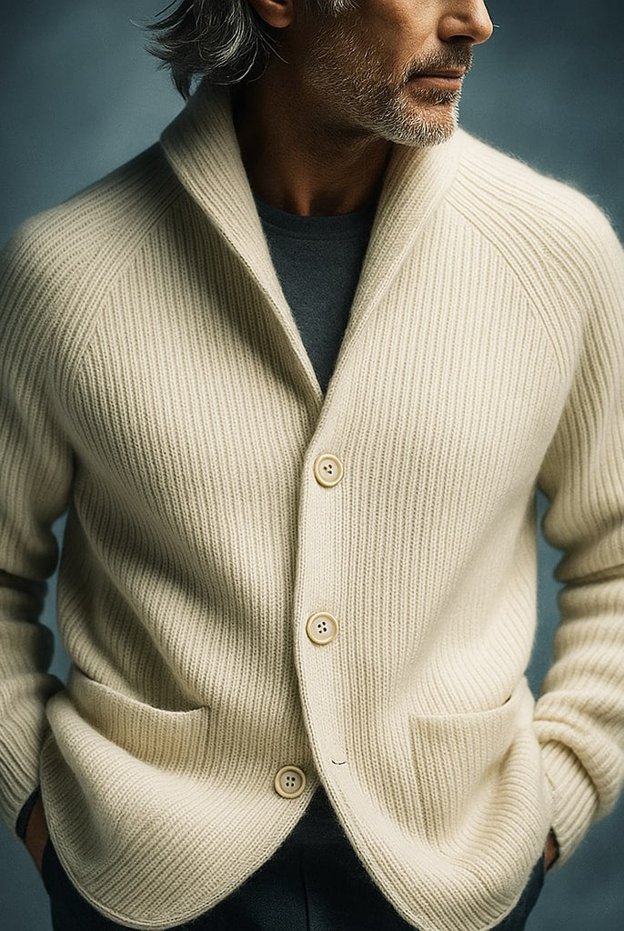 Close-up of the shawl collar on the men's wool cardigan, emphasizing its refined curve and finish.