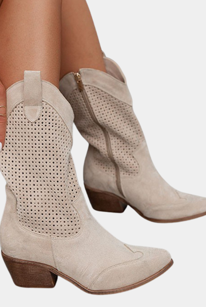 Close-up detail of the premium synthetic leather texture and pointed toe design of the orthopedic cowboy boots.