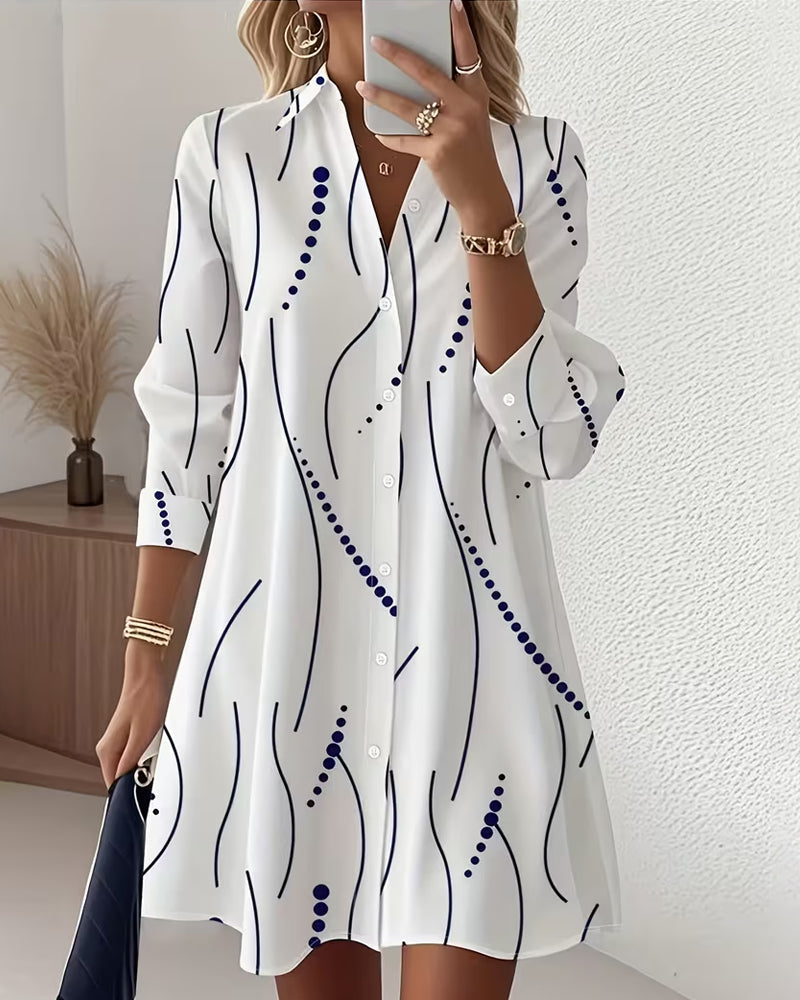Front view of the Hadley wavy collar A-line dress in white, showcasing the unique lapel and full length.
