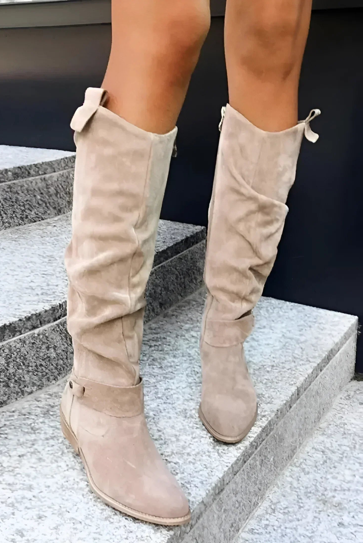 Close-up of the elegant dark brown Kalina knee-high suede boots, highlighting the soft texture and precise stitching.