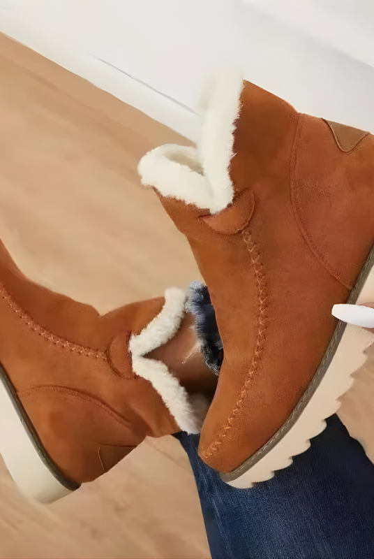 Detailed shot of the flexible outsole and orthopedic cushioning of a Kira ankle boot.