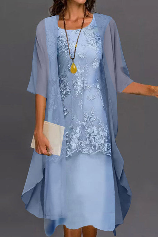 Front view of a woman wearing the blue Lumi chiffon two-piece dress, showcasing its flowing silhouette and elegant drape.