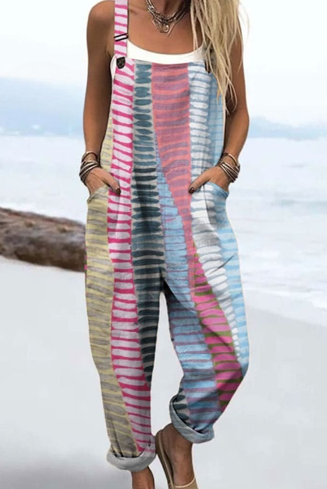 Front view of the Lysandra striped relaxed jumpsuit, showcasing its muted pastel colors and loose-fitting design on a female model.