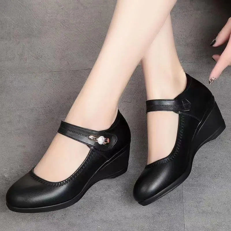 Lifestyle image of Paloma mid-heel shoes worn with a smart casual outfit, highlighting their versatile style.