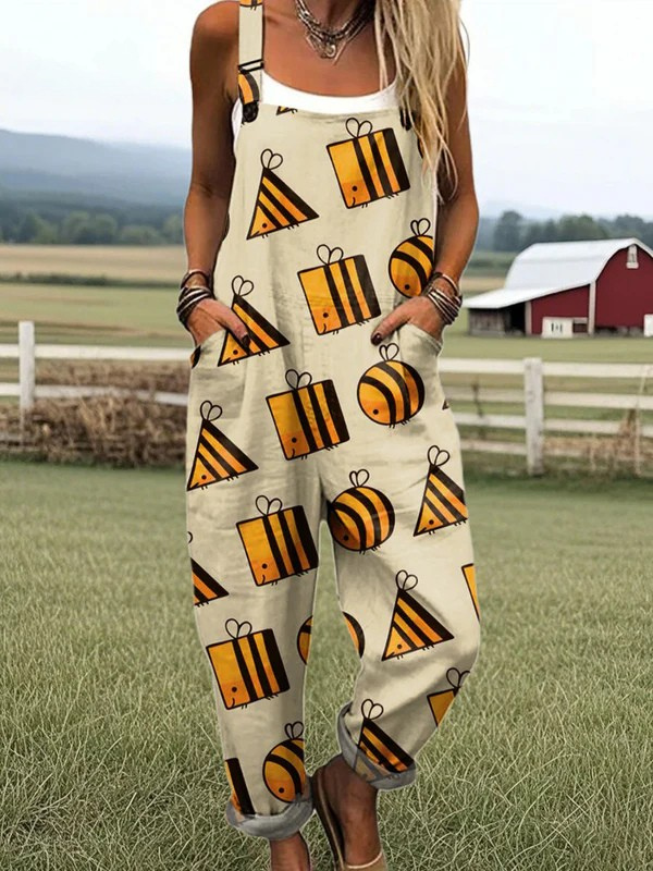 Front view of the Seraphina whimsical bee print jumpsuit on a model, showcasing its relaxed fit and graphic bee pattern on a light background.