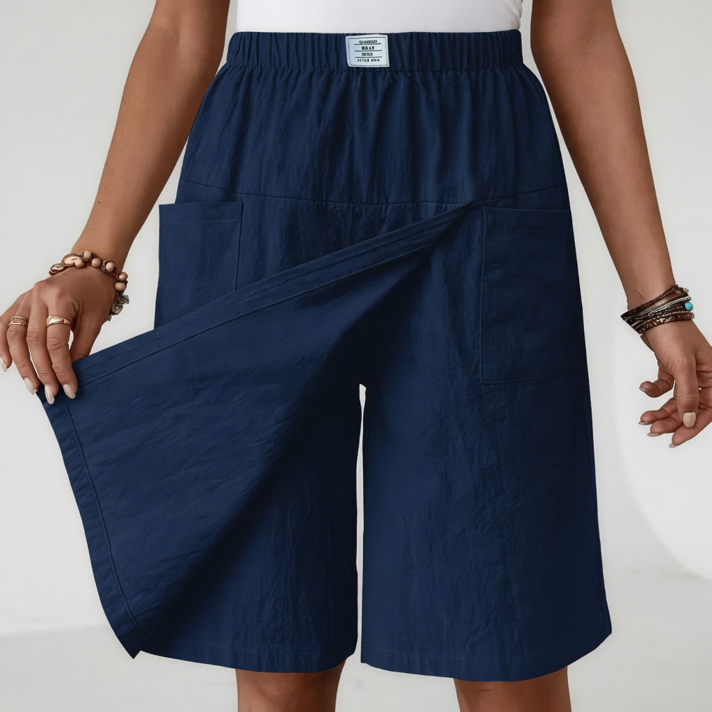 Lifestyle shot of the broken white skort shorts, demonstrating comfortable movement and stylish silhouette.