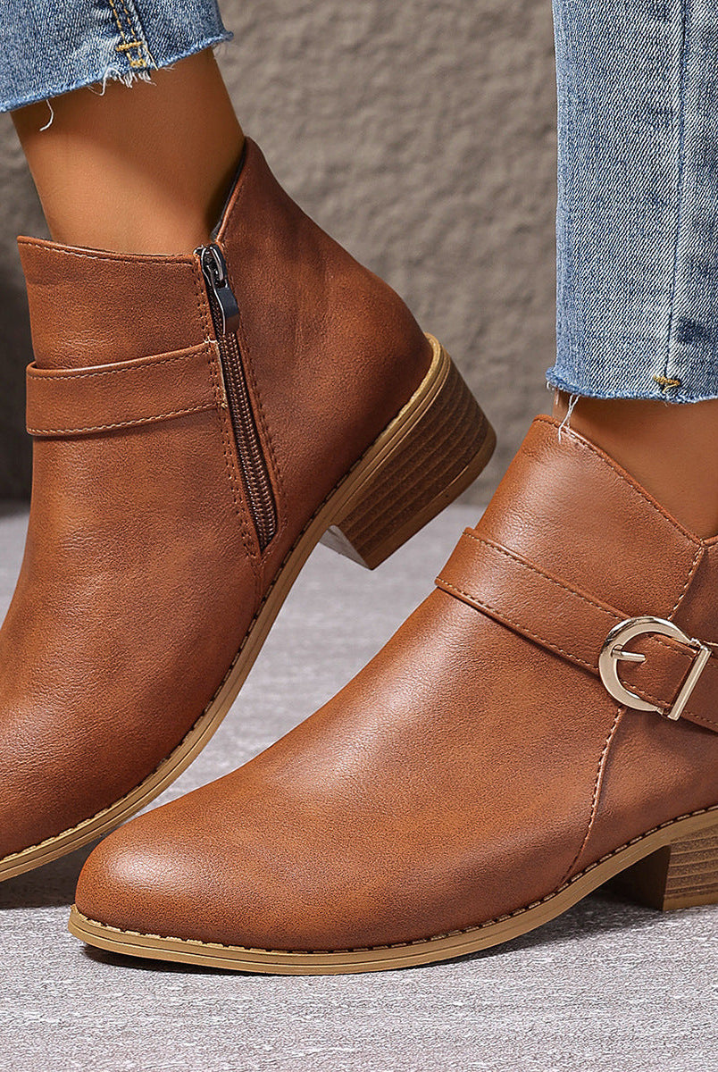 Side view of a brown Zara comfort ankle boot, showcasing its sleek silhouette and low heel.