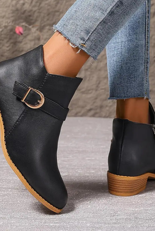 Frontal close-up of the black Zara comfort ankle boot, highlighting the soft-touch finish and toe shape.
