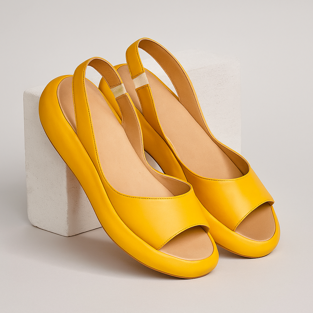 Yellow Zara open-toe non-slip sandals, angled view, displaying the textured non-slip sole for reliable grip.
