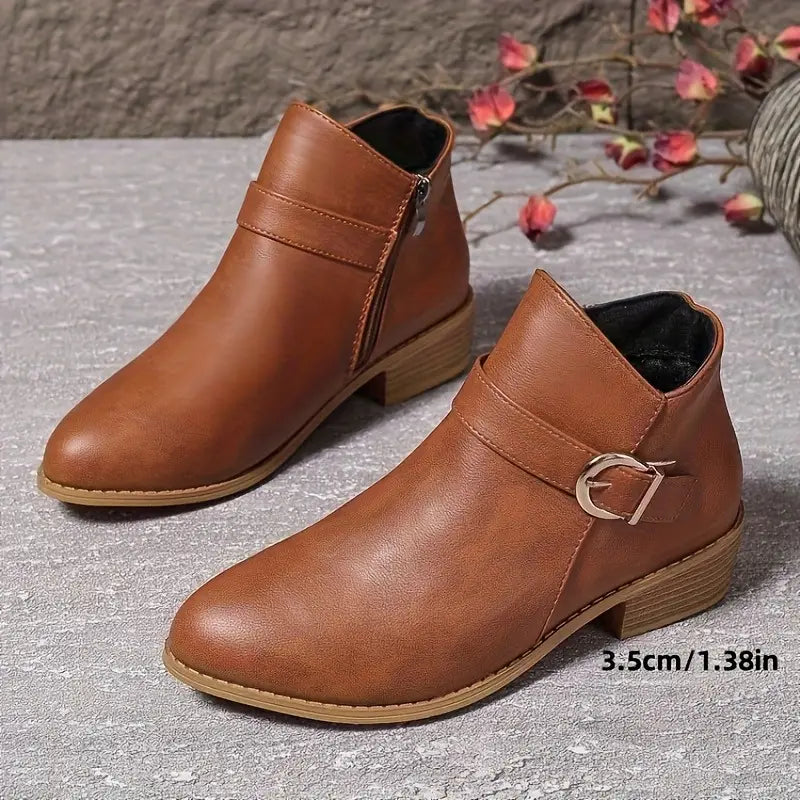 Interior view of the Zara comfort ankle boot, revealing the lightly padded insole for cushioning.