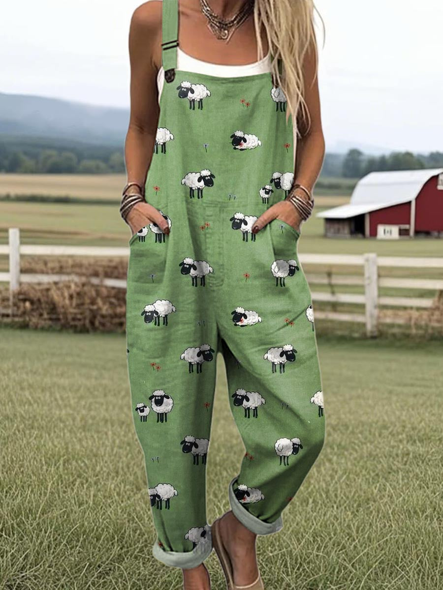 Front view of the Adira playful sheep jumpsuit, showcasing its earthy brown fabric, bib front, and whimsical sheep pattern.