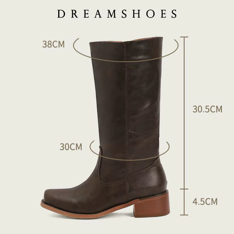 Close-up of the toe area of the brown Anya classic western boots, featuring the subtly pointed shape and smooth finish.