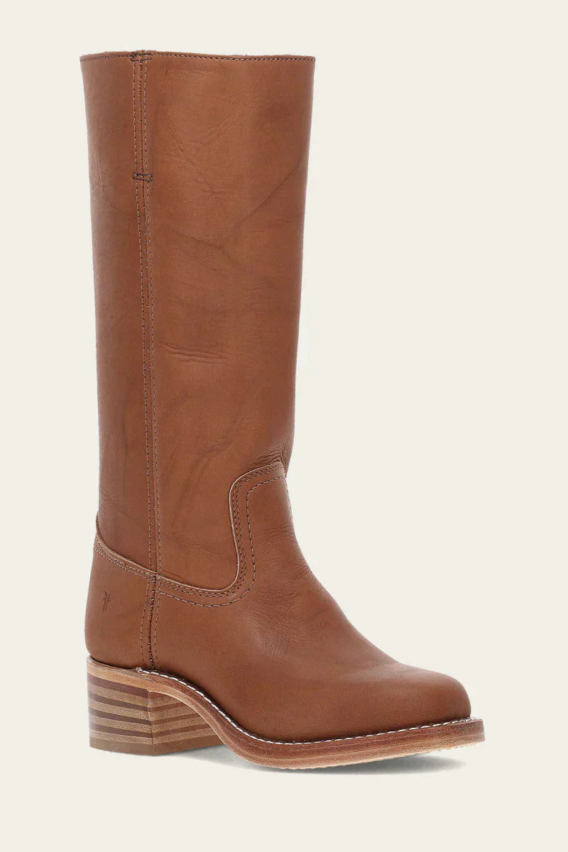 Anya classic western boots in brown, worn by a model in a casual outdoor setting, showcasing their comfortable fit.