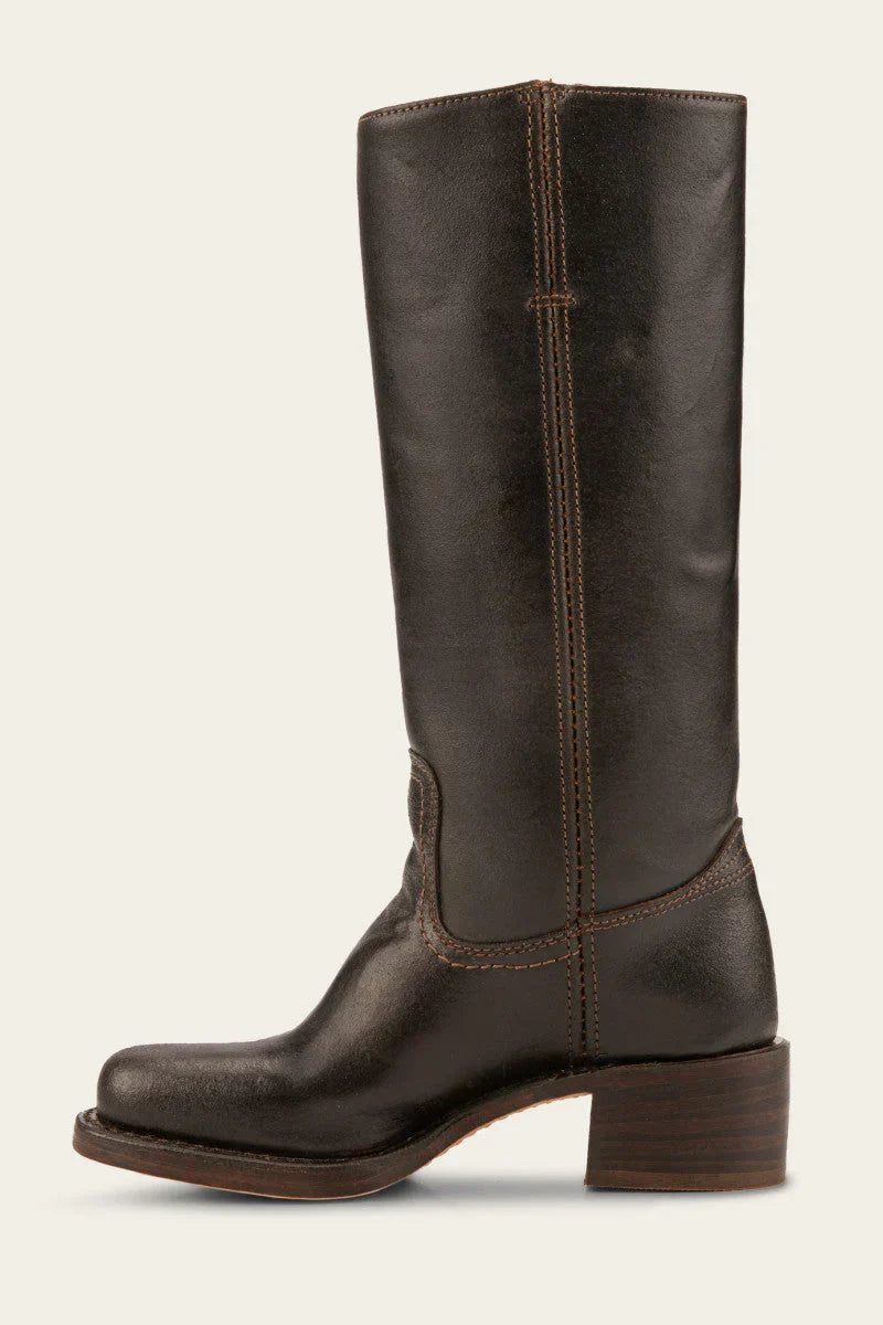 Anya classic western boots in light brown, displayed against a rustic background, highlighting their authentic charm.
