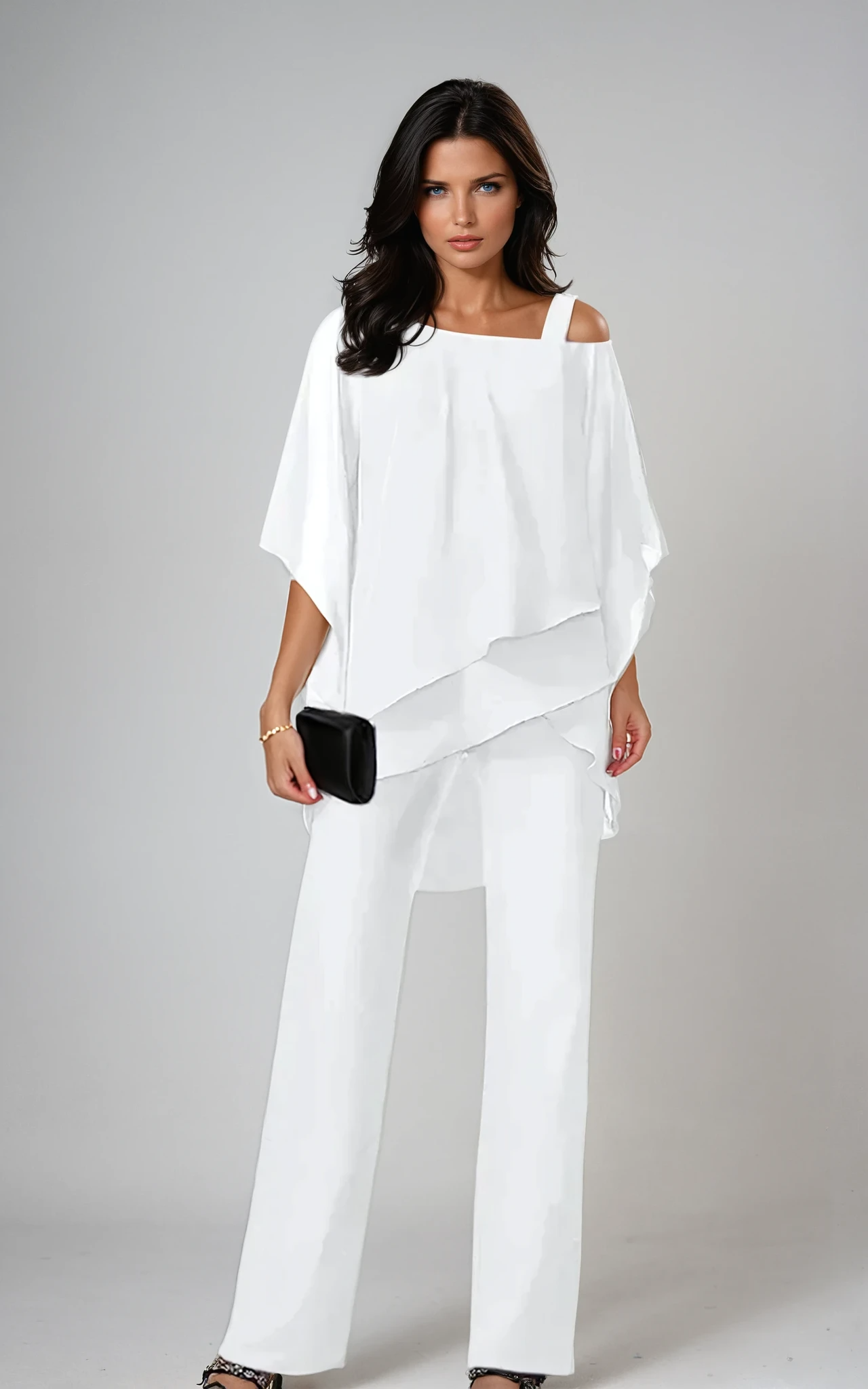 Front view of the Aviana two-piece layered set in black, showcasing its flowing top and wide-leg trousers on a model.