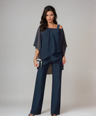 Back view of the sophisticated two-piece layered set in navy blue, emphasizing the comfortable and non-restrictive silhouette.