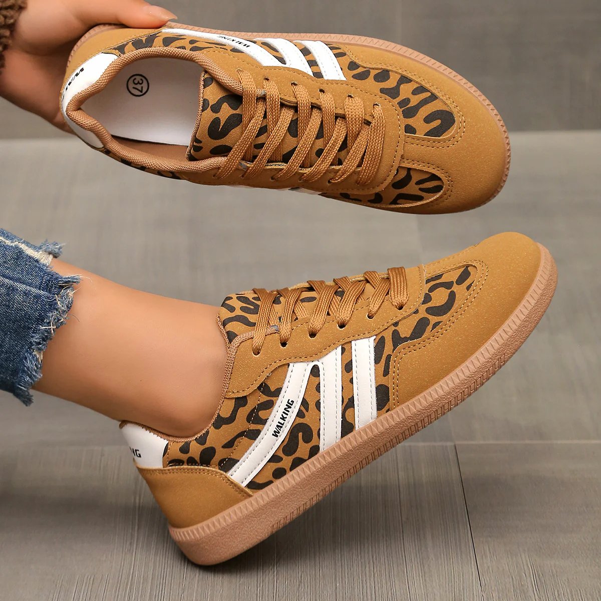 A pair of brown Briony orthopaedic trainers placed side-by-side, ready for wear.