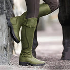 Overhead shot of two pairs of Calliope orthopedic leather boots in brown and dark brown, demonstrating color options.