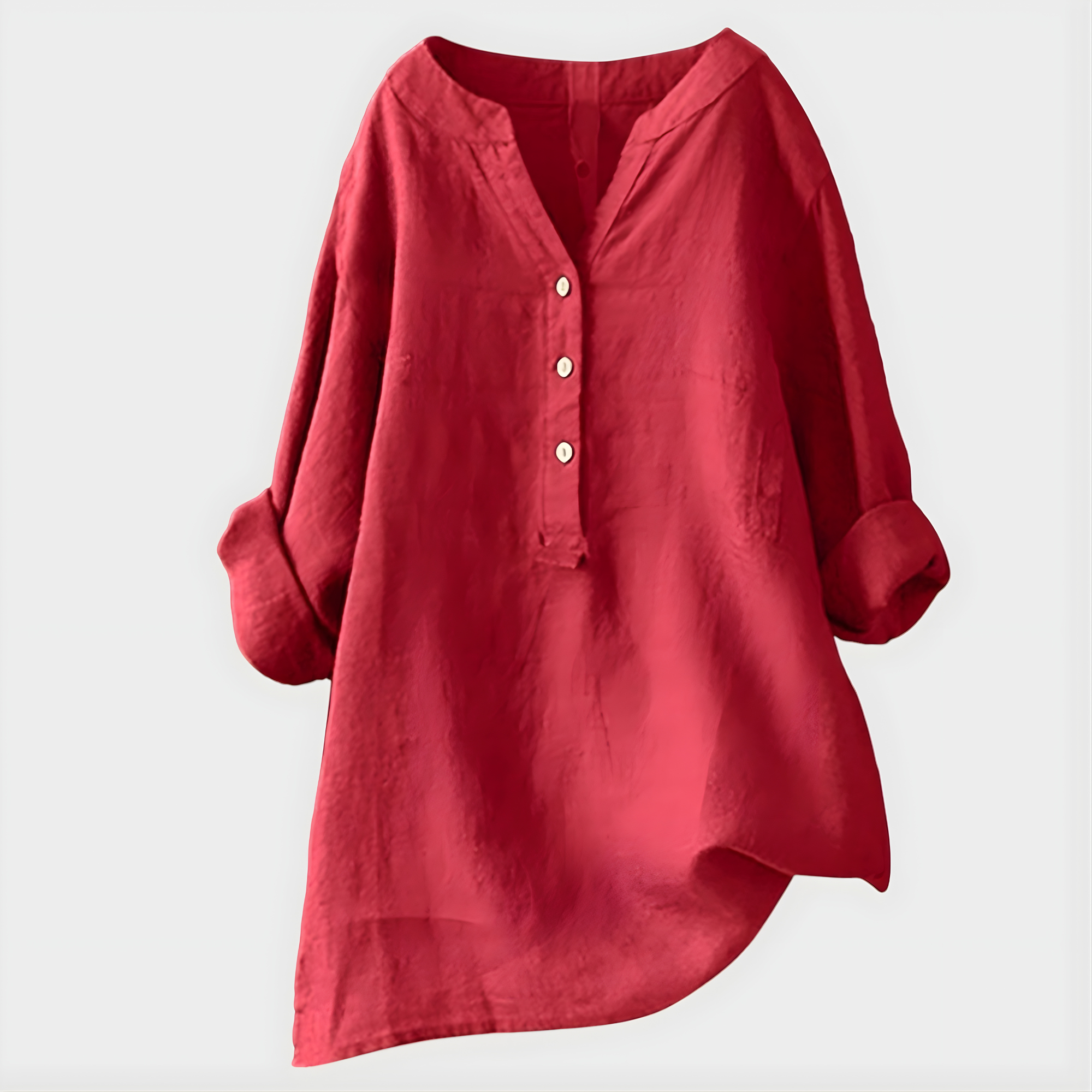 Front view of a woman wearing the Elara elegant cotton-linen blouse in watermelon pink, casually styled.