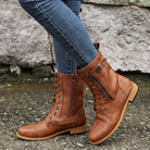 A close-up view of the Elara women's orthopedic comfort boots in black, showcasing the smooth synthetic leather and robust sole.