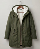 Detail of the wrist cuff and sleeve design on the khaki Elara parka, indicating a secure fit.