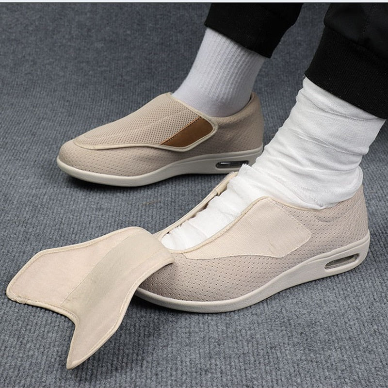 Side profile view of the gray Elara diabetic comfort shoe, highlighting the flexible sole and overall ergonomic design.