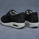 A woman's foot gently sliding into an Elara diabetic comfort shoe, illustrating the easy on-and-off feature.