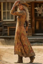 Detailed shot of the long sleeve and cuff area of the multicolour Elara bohemian floral maxi dress.