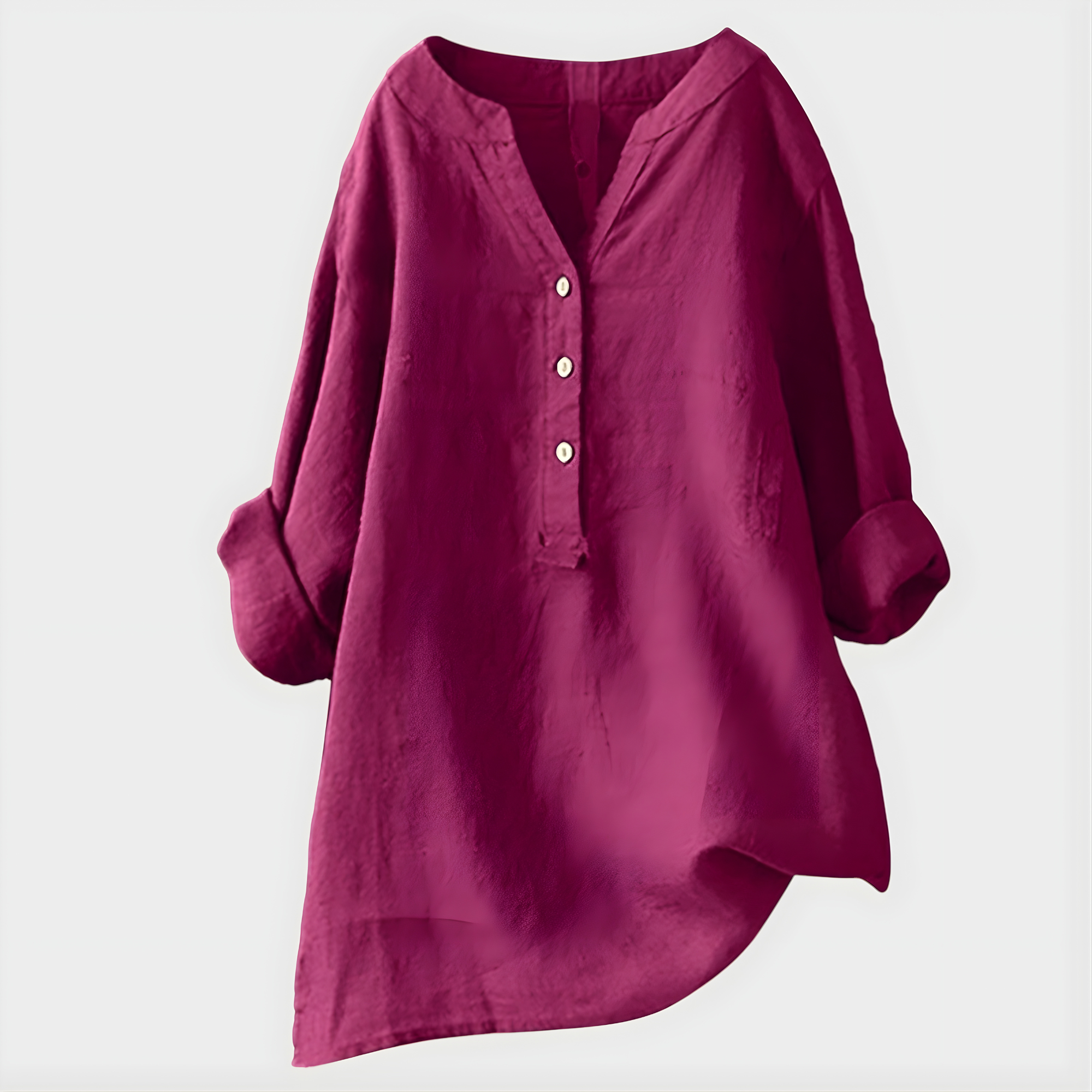 Detail shot of the V-neckline and sleeve cuff on the black Elara blouse, emphasizing craftsmanship.