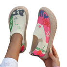 Rear view of the Ella artistic slip-on shoes, emphasizing the smooth, laceless design and sole cushioning.