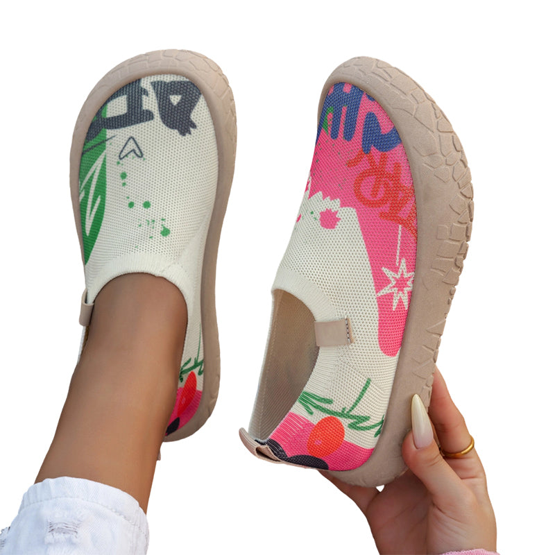 Rear view of the Ella artistic slip-on shoes, emphasizing the smooth, laceless design and sole cushioning.