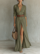 Lifestyle shot of a woman wearing the Paloma long sleeve linen blend maxi dress, walking outdoors.